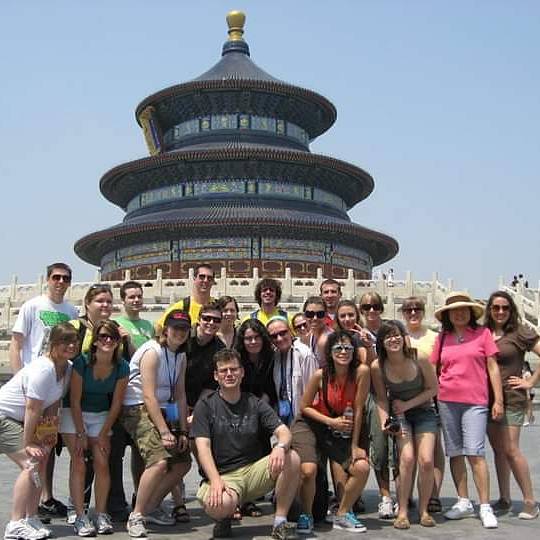 Faulds' group in China at a monument