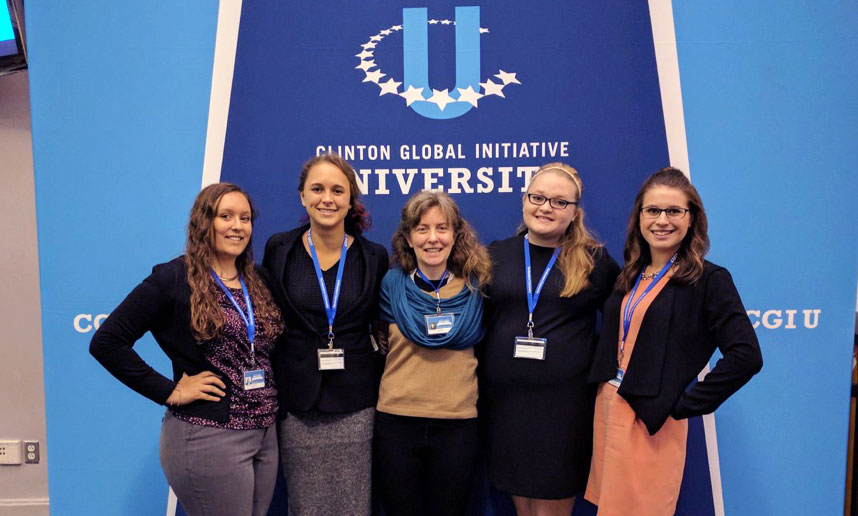 Jennifer Leigh with students at CGIU